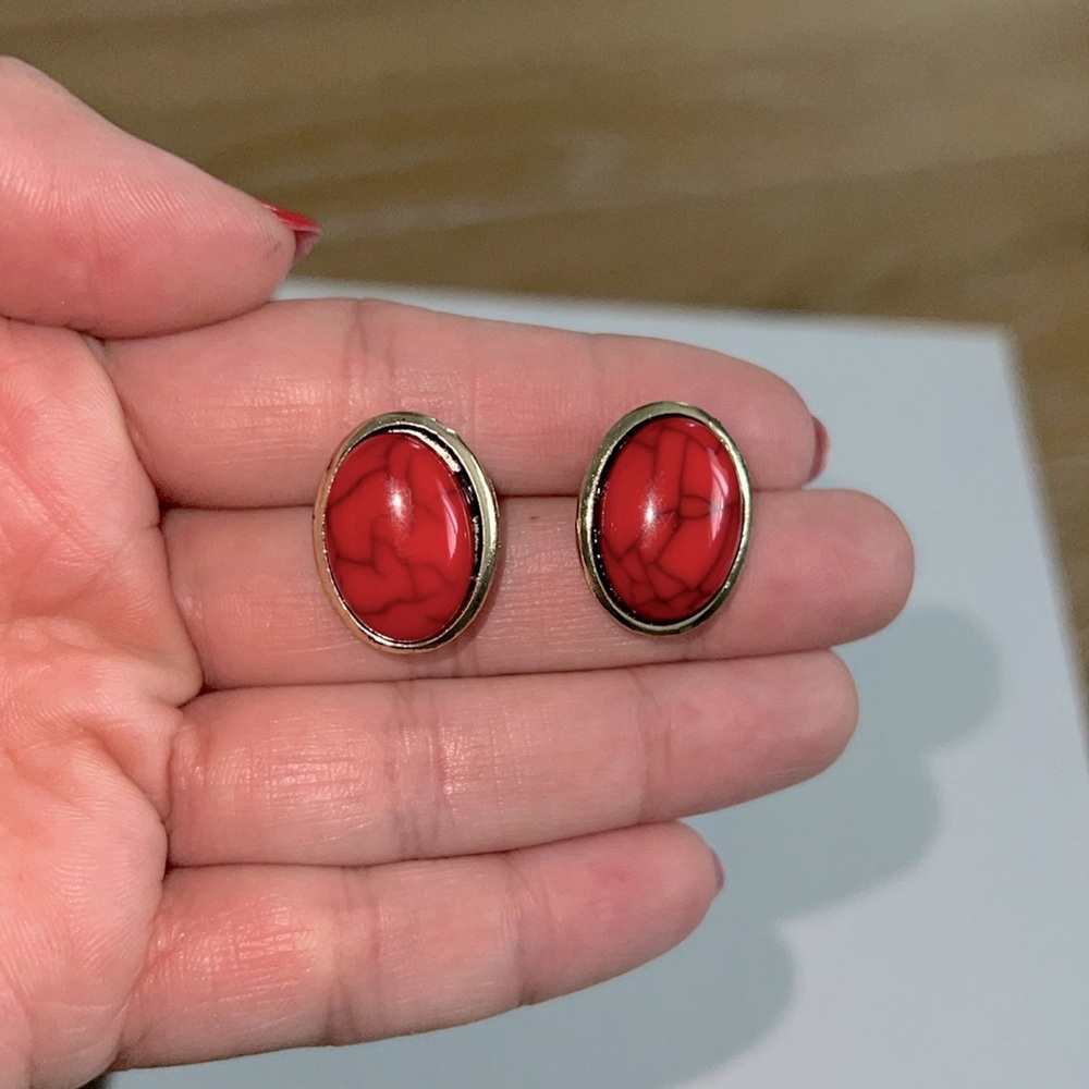 Red oval shaped earrings